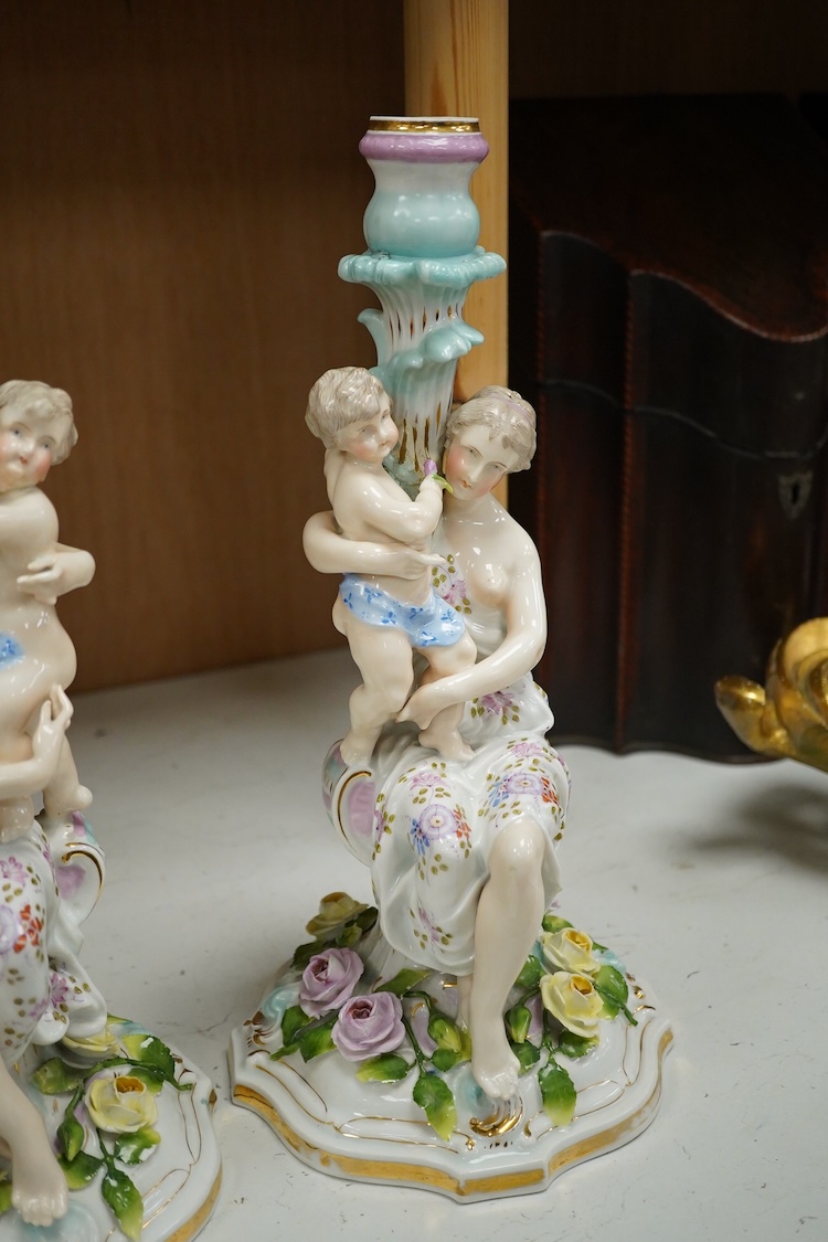A pair of Jacob Petit porcelain figural candlesticks, 34cm